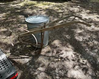 antique plow with metal wheel