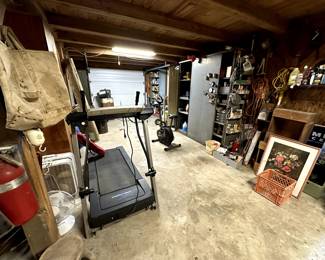 Treadmill (works fine), exercise bike, metal tool storage cabinets
