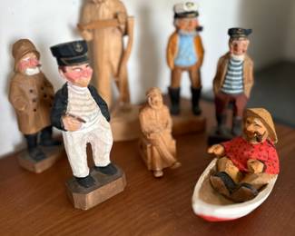 Wood carved sailors