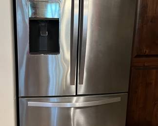 Whirlpool French Door w/bottom Freezer (Model WRF757SDEM01) - $400 Sorry, puppy not included.