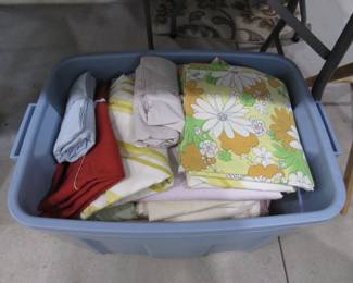 Tub of sheeting for quilt backs.