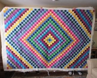 Colorful and large "Around The World" quilt top to finish.