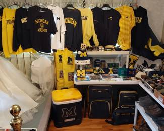 U of M: cooler, camp style chairs, sweatshirts, short sleeve shirts, vests, coasters, books, hats, crocks, ornaments, blankets, bowl, flag, slippers, Santa hat, euchre game, cribbage board, salt and pepper shakers