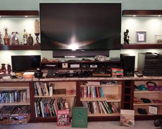 Atari w/paddles, joystick, and games, Sony blu-ray player, Sony component system, Sony soundbar, Sony Bravia 65” TV, Bose soundlink mini, Canon EOS 630, iHome dock radio, Amazon echo dot