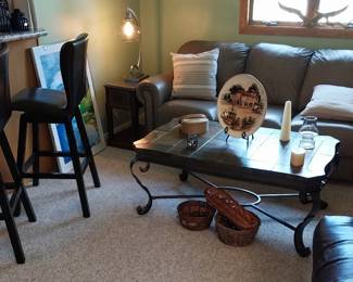 Lane leather couch, leather storage bench, leather bar stools, cane chairs, table lamps