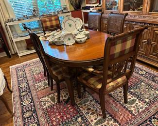 19th century French dining table with two additional leaf and pads and chairs, purchased from Sloans in New York; table and chairs custom upholstered and refinished