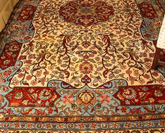 939 Tabriz 9.7 x 14 Medallion Rug 450.00