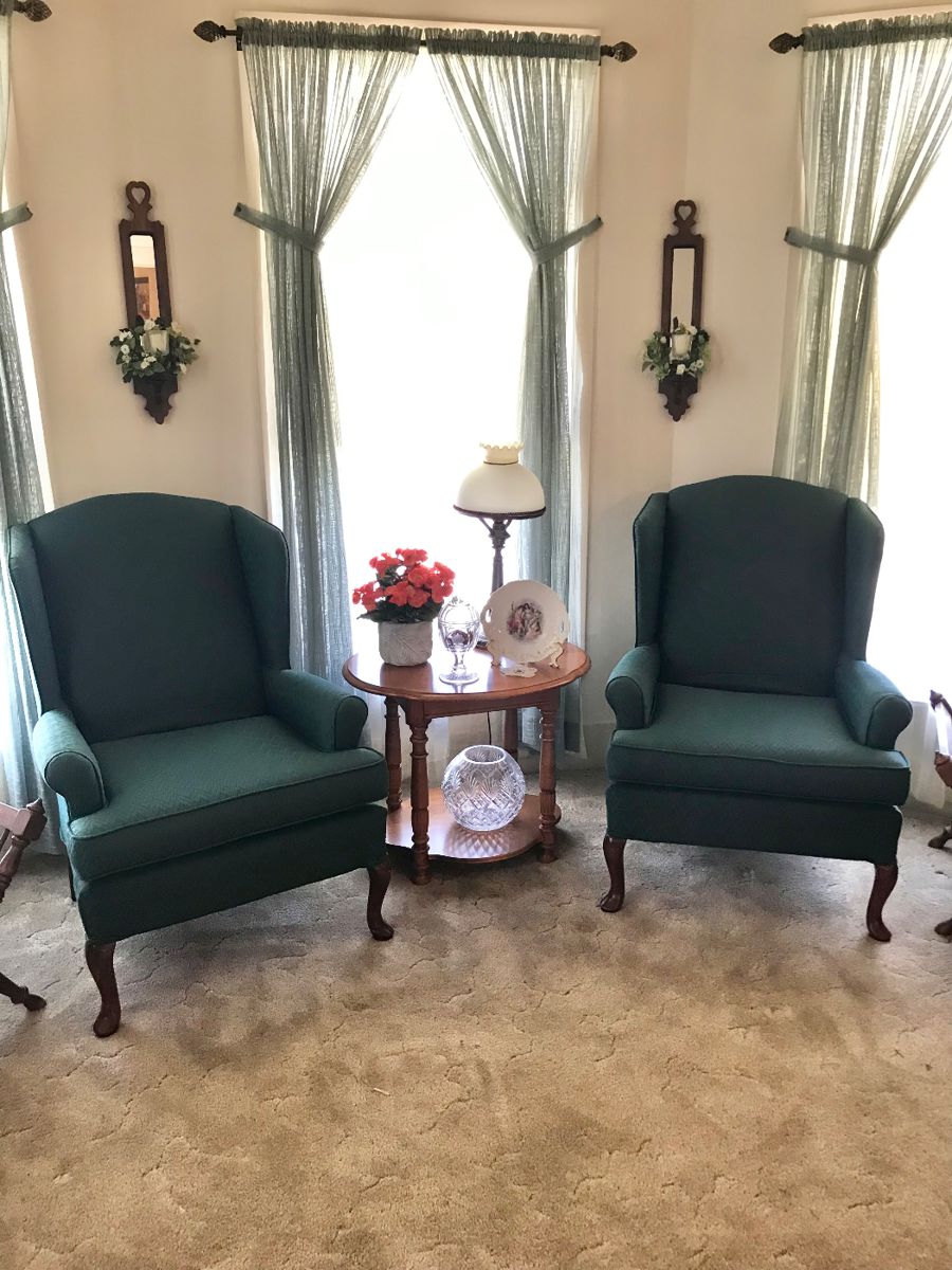 Nice hunter green side chairs, table and wall sconces