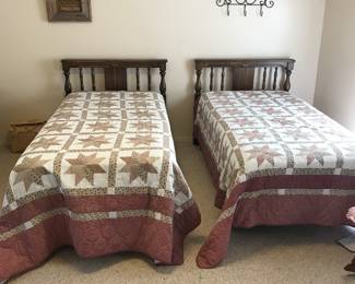 Twin beds with mattresses