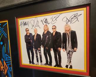 Framed Def Leppard autographed picture with concert memorabilia