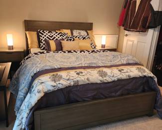 Beautiful, lightly used (maybe never used) bedroom suite.  Includes:  Queen bed with headboard, footboard, mattress, box spring, 2 nightstands, triple dresser with mirror 