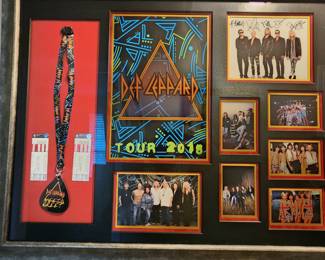 Framed Def Leppard autographed picture with concert memorabilia