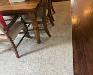 large elegant area rug (in dining room)