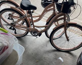 2 ladies 26" Bikes with helmets