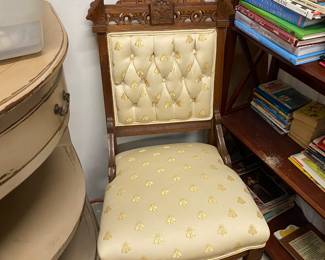 Victorian style chair with bumble bee upholstery