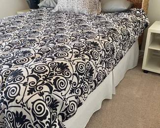 queen bed, wicker headboard, mattress, box springs, night stand and white chest