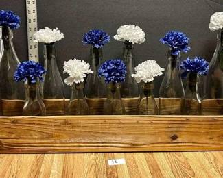 Center Piece with Glass Bottles with Artificial Blue White Flowers