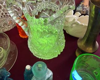 Antique cut glass Pitcher glowing green under 365nm black light