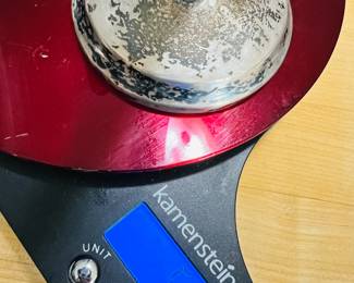 Sterling reinforced candlesticks weighing approximately 550 grams