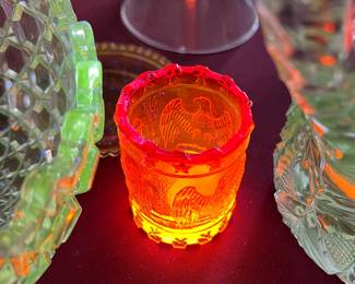 Amberina glass glowing under 365nm black light ultraviolet light