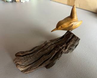 Bryan Whaley carved bird on driftwood, signed and dated (1984).