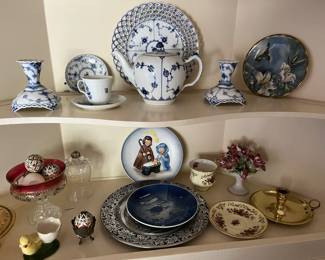 Nice selection of Royal Copenhagen pottery (top shelf).