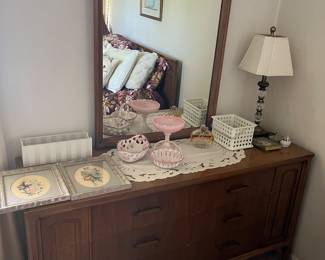 Mid-century modern dresser with mirror.
