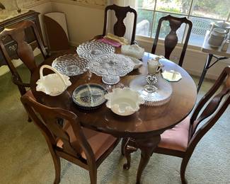 Dining table with six chairs (one chair not shown).