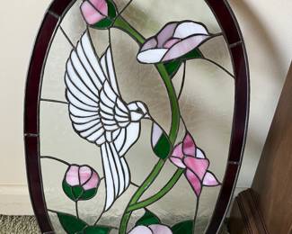 Stained glass art with hummingbird theme.