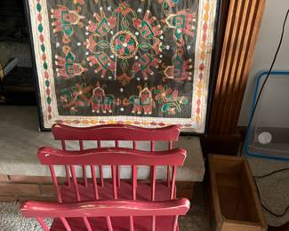Vintage painted MCM wood magazine rack; vintage Eastern European embroidered tapestry, framed.