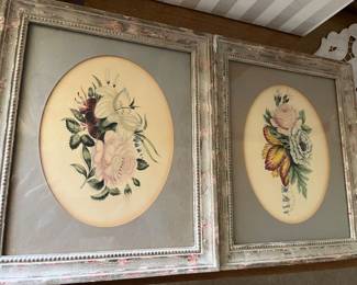 Vintage floral prints in wood frames.