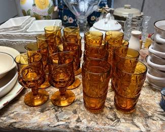 • Two Sets of Amber glasses