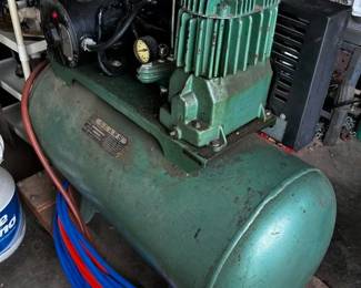 vintage large air compressor for a shop