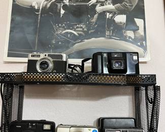 The photograph above the metal shelf was one of his pictures.