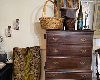 The upright vintage chest with 6 drawers measures   
 33w x 18d x 56 h.