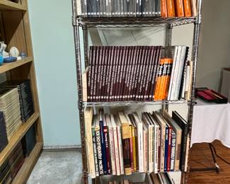 The books at the bottom are "How to" books.  They cover subjects such as wiring, painting , wallpaper, etc.