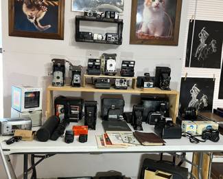 There are some amazing cameras and movie cameras in this collection. My client's father was a professional photographer for Life Magazine for part of his life. you will find Polaroids, Kodak, Keystone, Canon, and Minolta, just to name a few!!!!