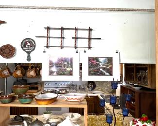 Be sure and notice the vintage chrome and ceramic teapot with its cream and sugar.