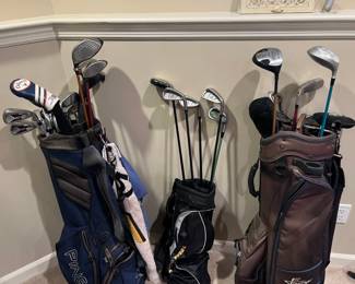 golf clubs and bags