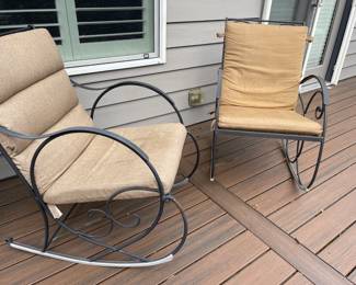 Two Black Metal Outdoor Rocking Chairs with Scroll Design