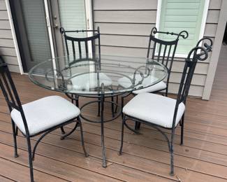 Round Glass Top Table with Black Iron Base, Set of Black Iron White Upholstered Seat Dining Chairs