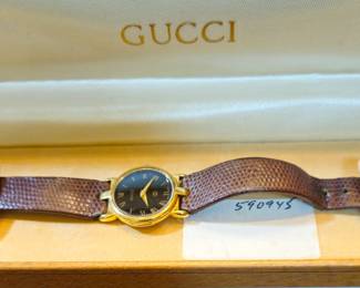 Gucci watch in original box. 1984.