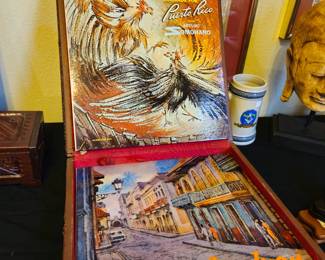 Two of the record albums in the tooled leather case.