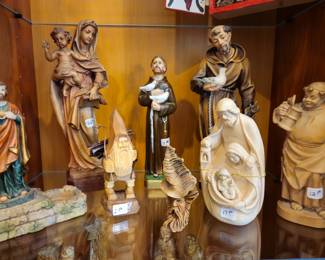 A few of the collection of carved  wood Religious figures