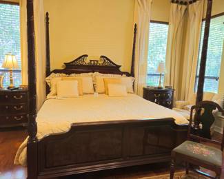 Queen four poster bed with adjustable mattress.