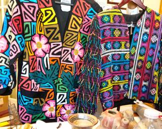 Jacket on the left is made of of mola fabric. Jacket on the right is from Guatemala