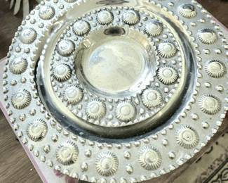 Pewter chargers with design found on early South West Native American and Mexican  jewelry