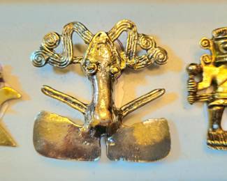 Reposa golden huaca pin/pendants. 14k over .925