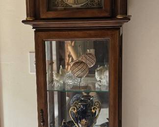 Clock lighted display cabinet