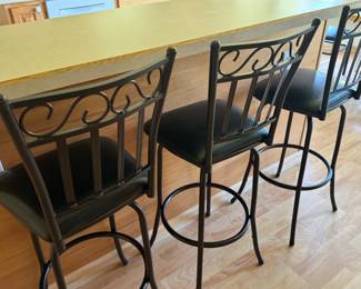 Black lacquer bar stools (we have four matching dining chairs as well).